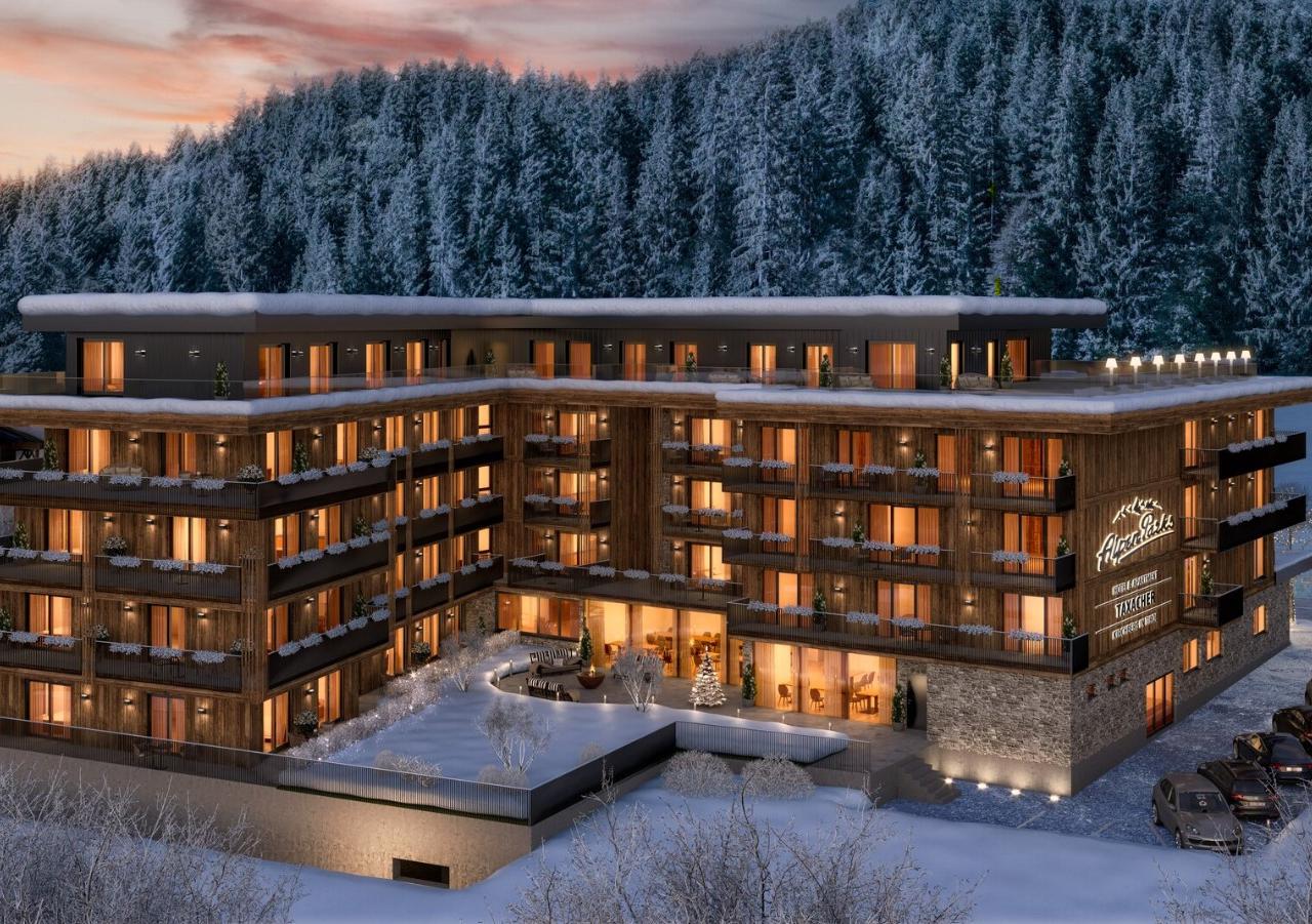 Alpenparks Hotel & Apartment Taxacher i Kirchberg tilbyder luksuriøse hotelværelser samt moderne, stilfulde lejligheder til dem, der gerne vil have ekstra plads og privatliv. Hver lejlighed er fuldt udstyret og har en privat balkon, hvor du kan slappe af og nyde den fantastiske udsigt over Alperne. Med skibakken inden for gåafstand og en skibus, der stopper kun 50 meter væk, er disse lejligheder ideelle til en ubekymret skiferie. Som gæst, i lejlighederne, nyder du godt af de samme luksuriøse faciliteter som på hotellet. Efter en dag i sneen kan du slappe af i den omfattende spa med infrarød sauna, dampbad, swimmingpool, sauna og et afslappende afslapningsrum. For sportsentusiaster er der et moderne fitnesscenter. Har du ikke lyst til at lave mad? Så besøg hotellets egen restaurant og få et lækkert måltid. Her finder du den ideelle balance mellem frihed og luksus med alt, hvad du har brug for til et afslappende ophold i Alperne.